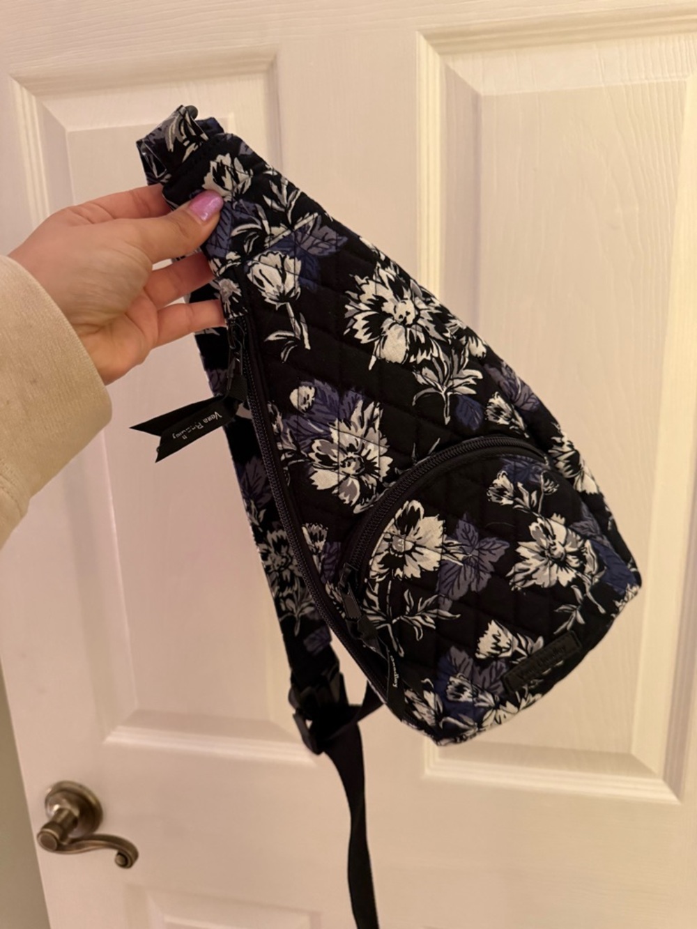 Vera Bradley Essential Compact Sling Backpack in the Frosted Floral pattern.